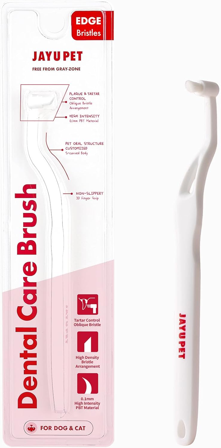 JNK pet toothbrush showing diagonal bristles and ergonomic handle